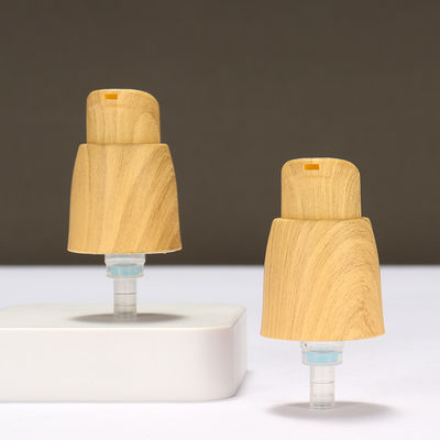 Outer Spring Airless 0.25cc Plastic Lotion Pump Hand Lotion Pump Dengan Gandum Kayu